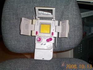 Truly a robot in disguise - the original Game Boy with Handy Boy attachment - providing additional light and stereo sound